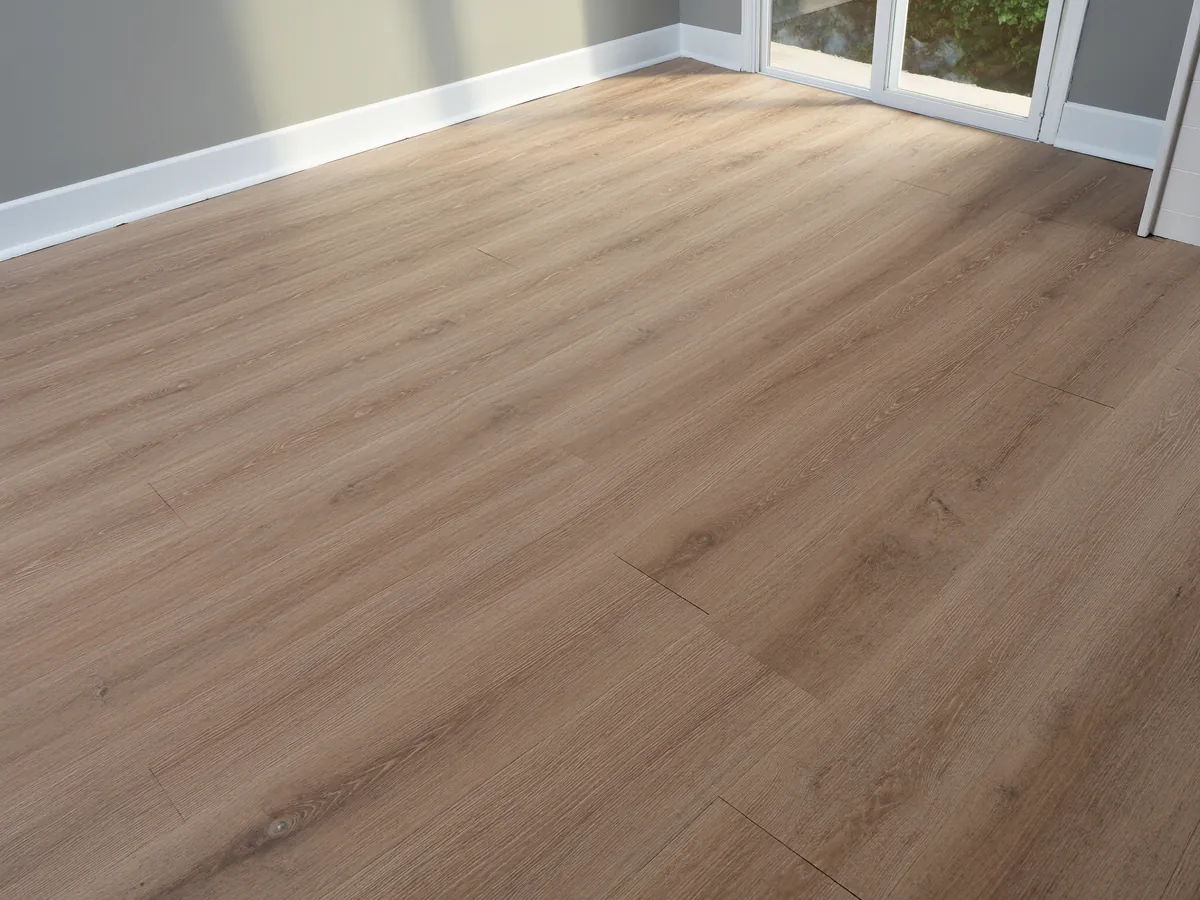 Wide waterproof luxury vinyl plank flooring running through an empty coastal room toward a sliding glass door